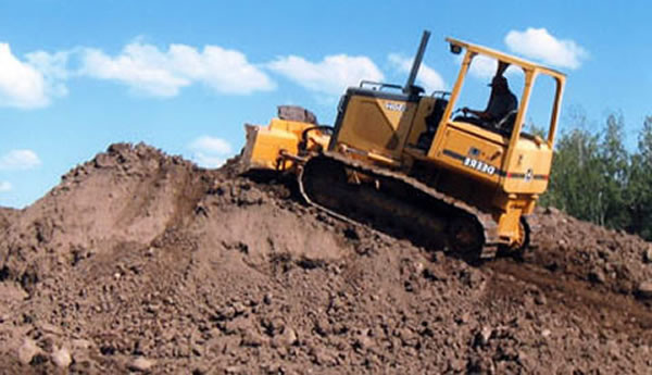 Photo of Kadlec Excavating dozer with rollover image of loader moving dirt.