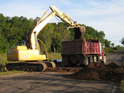 Kadlec Excavating removes dirt. (close up)