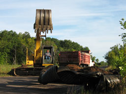 Piles of old culvert material.